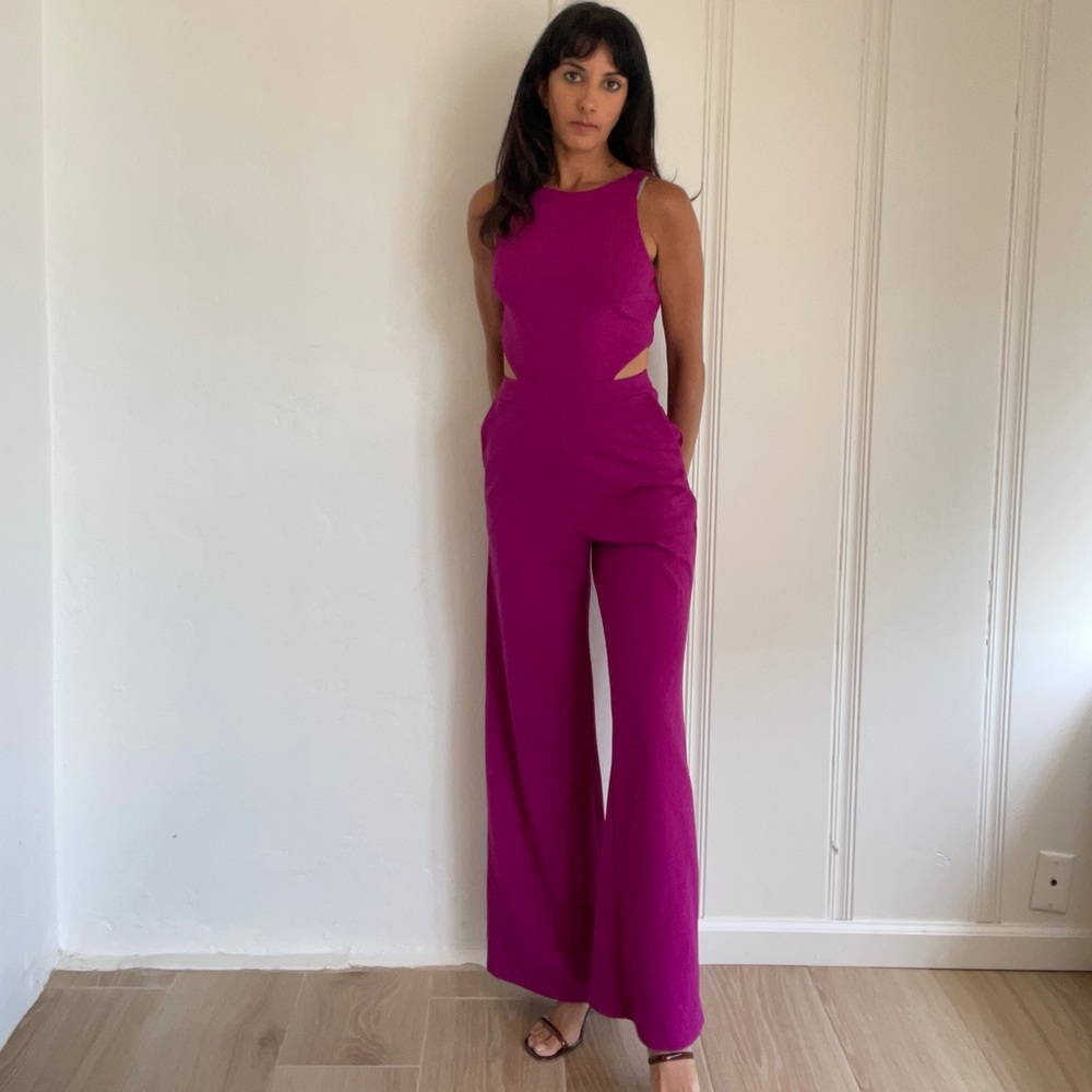 Magenta one piece cutout jumpsuit. Wide leg with pockets